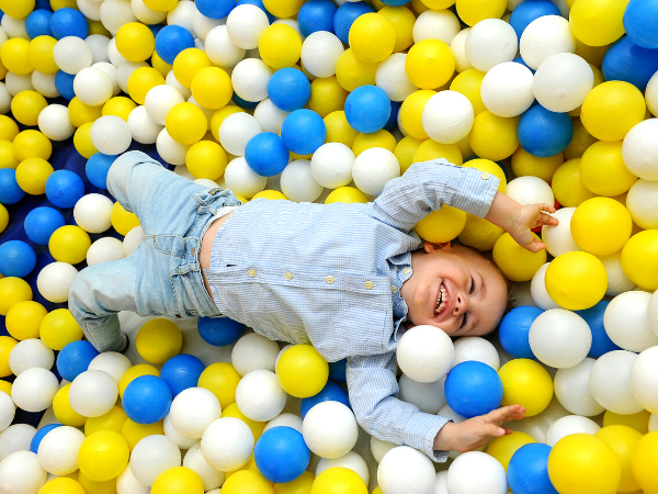 boy in ball pit