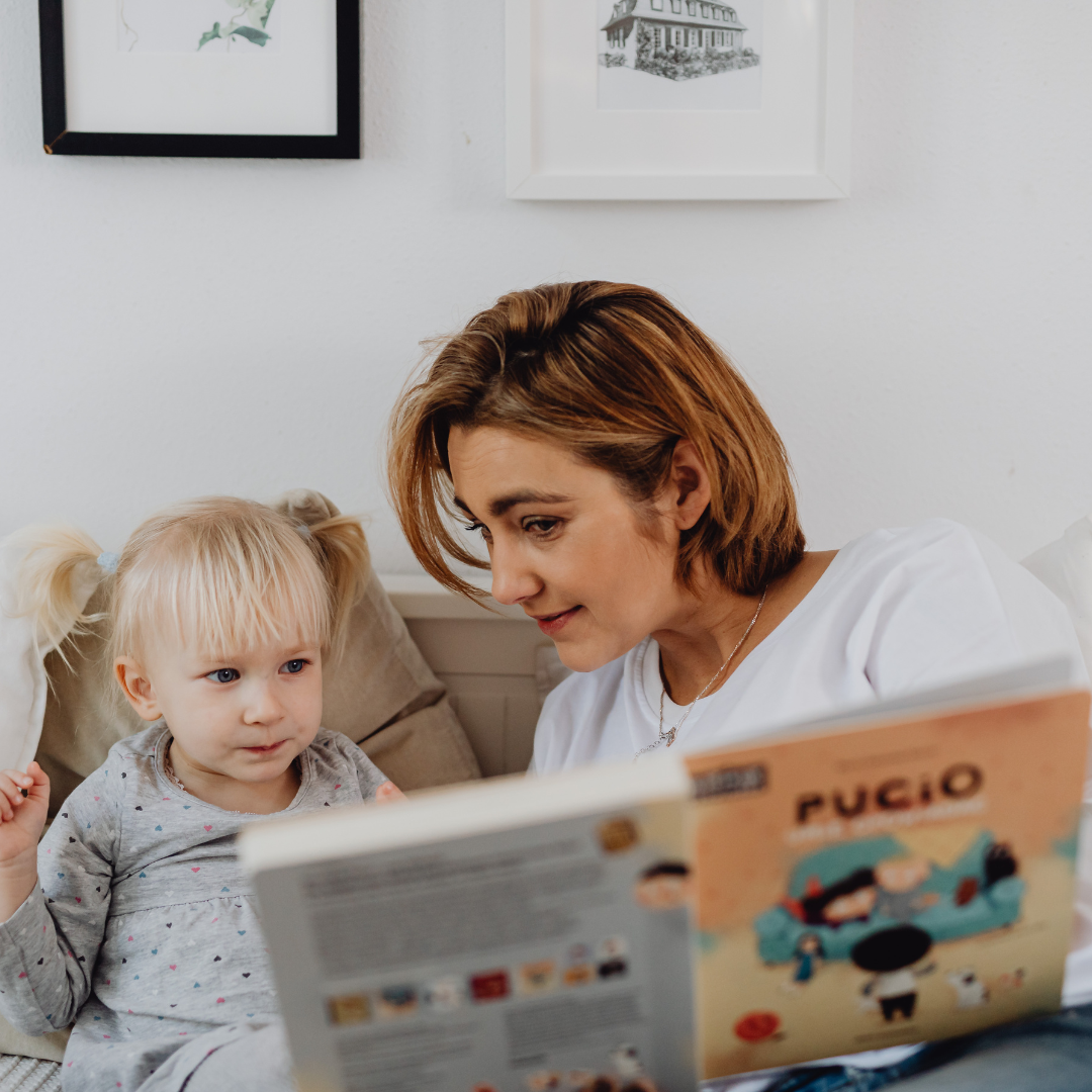 mom and baby reading 