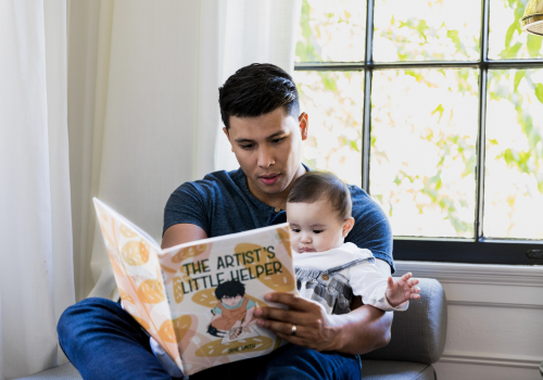 Parent reading to baby