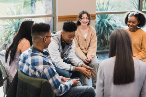 group sitting having a conversation